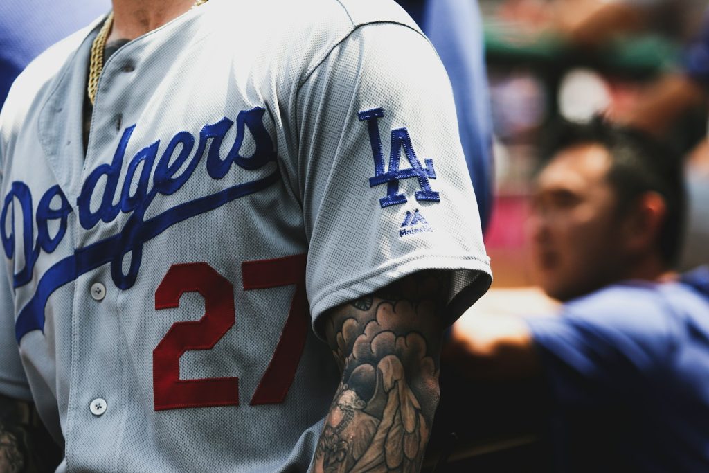 man in white and black jersey shirt