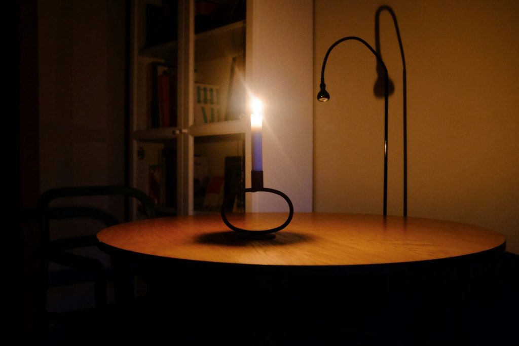 A candle that is sitting on a table